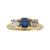 Anillo Tana de oro amarillo 18k con circonias y zafiro sintético Anillo Tana de oro amarillo 18k con circonias y zafiro sintético