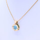 Colgante oro 18k 2 tonos con topacio azul. Colgante oro 18k 2 tonos con topacio azul.