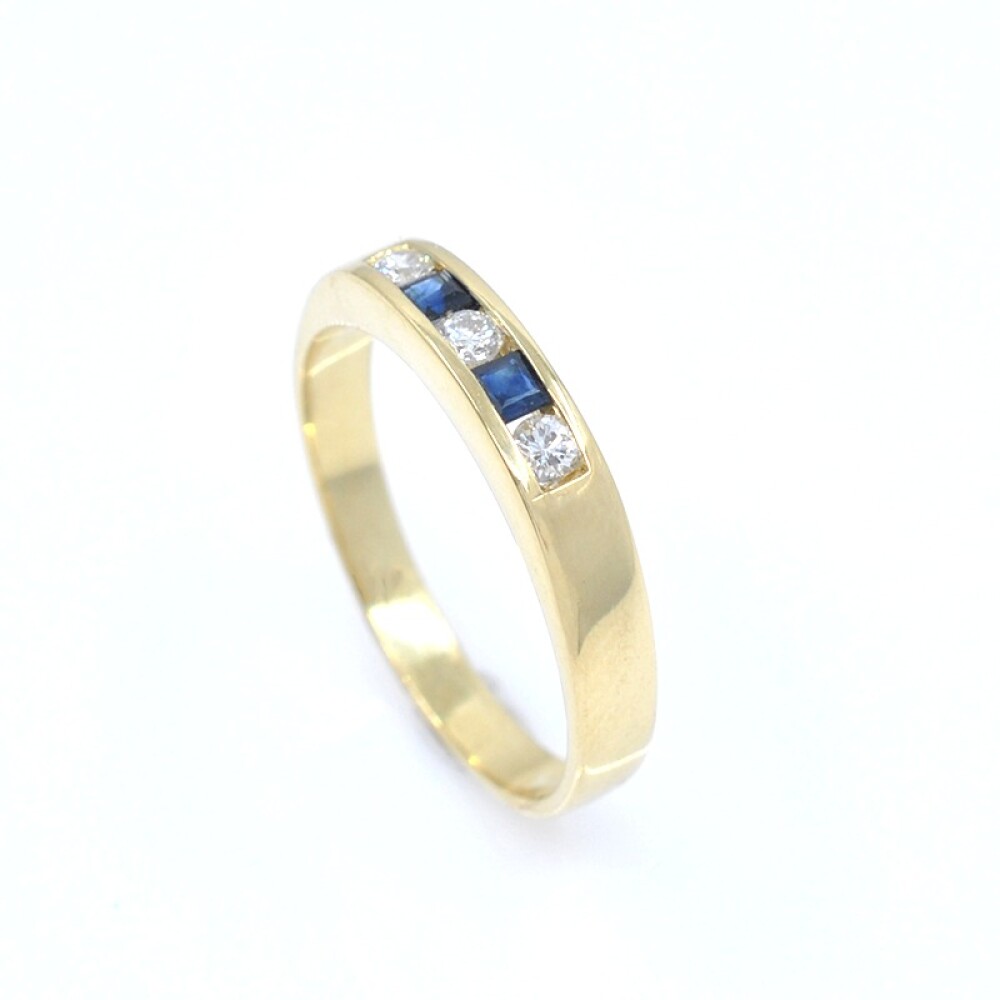 Anillo en oro 18k amarillo, brillantes y zafiros Anillo en oro 18k amarillo, brillantes y zafiros