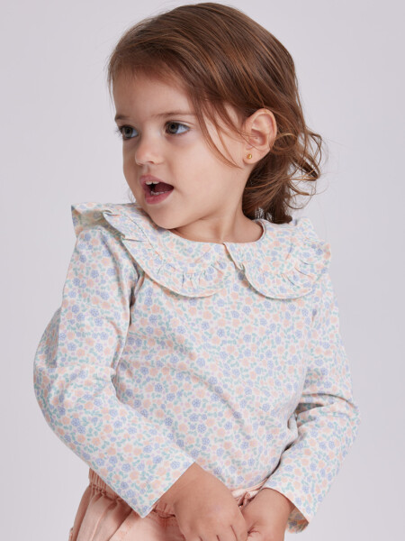 Remera manga larga cuello Flores Crema