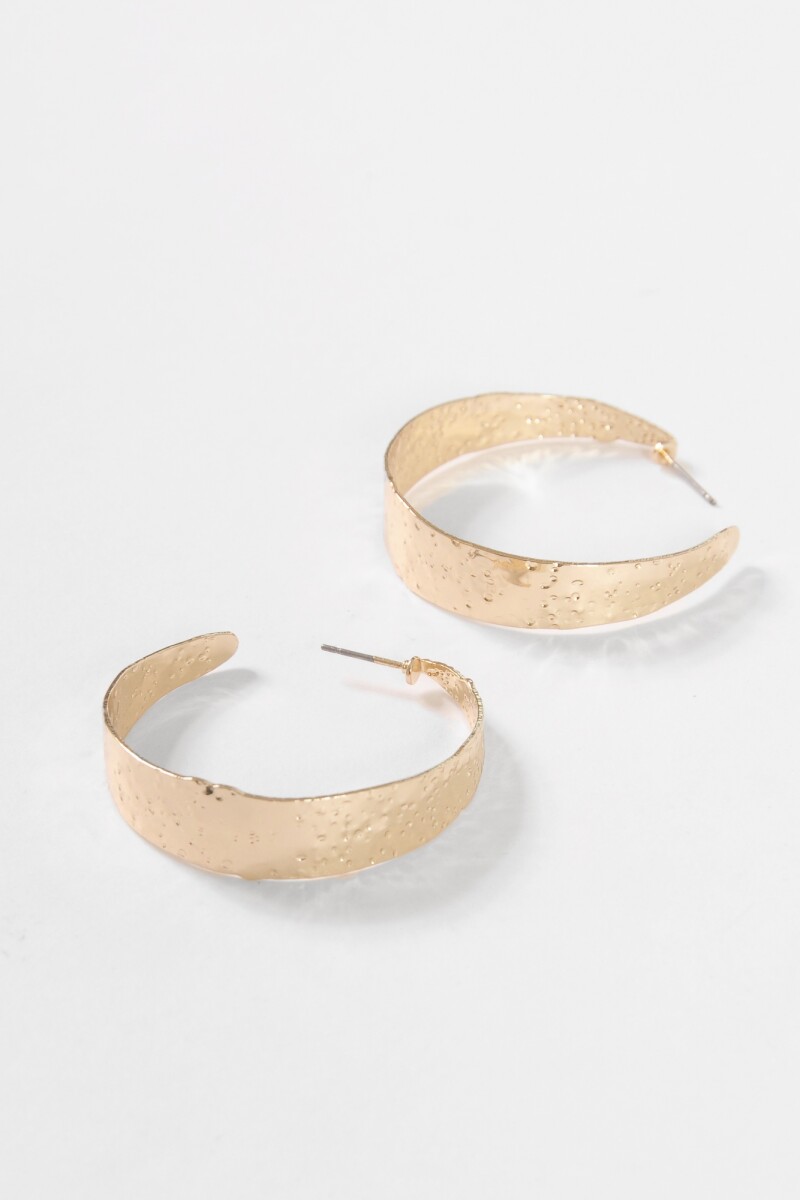 Caravanas con texturas dorado