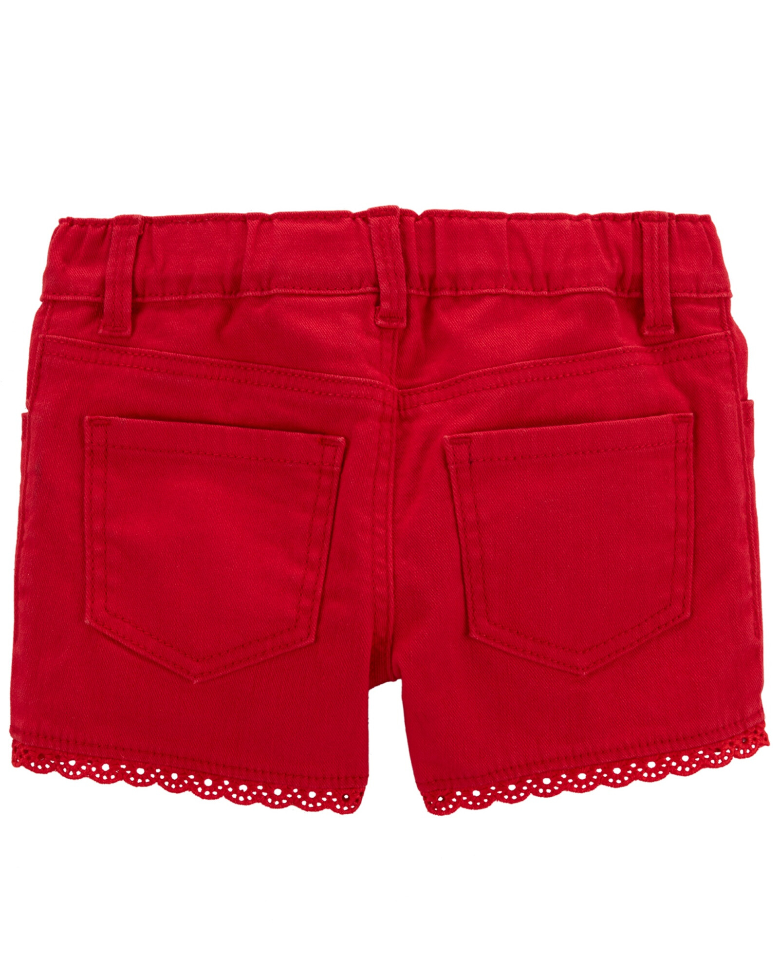Short de sarga, con ribete de ojales. Talles 2-5T Sin color