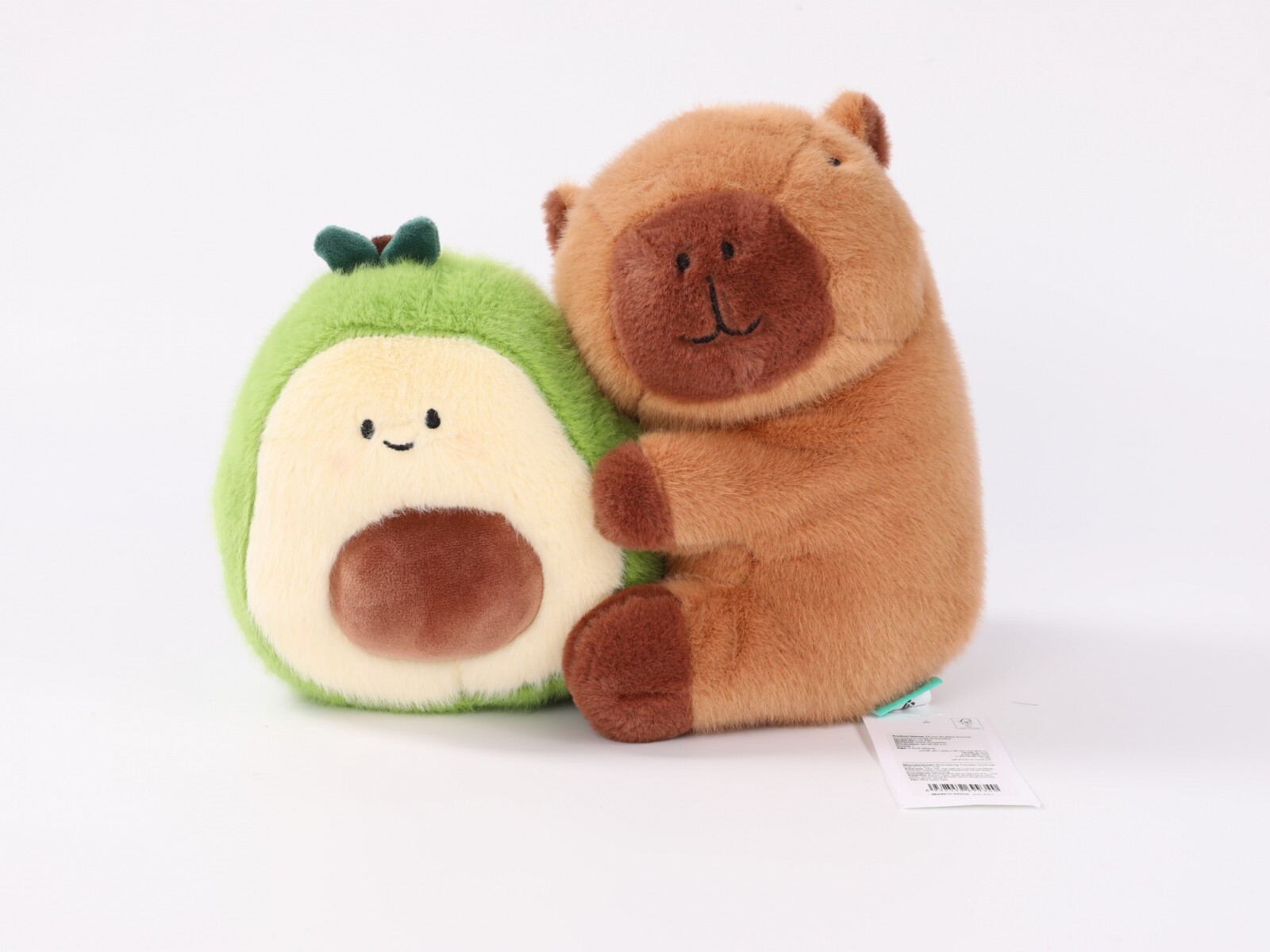 PELUCHE DE 23CM (CAPIBARA ABRAZA AGUACATE) 