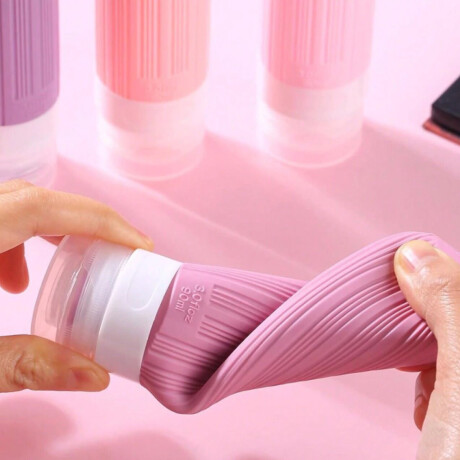 Set de 4 frasquitos de silicona para viaje Rosado