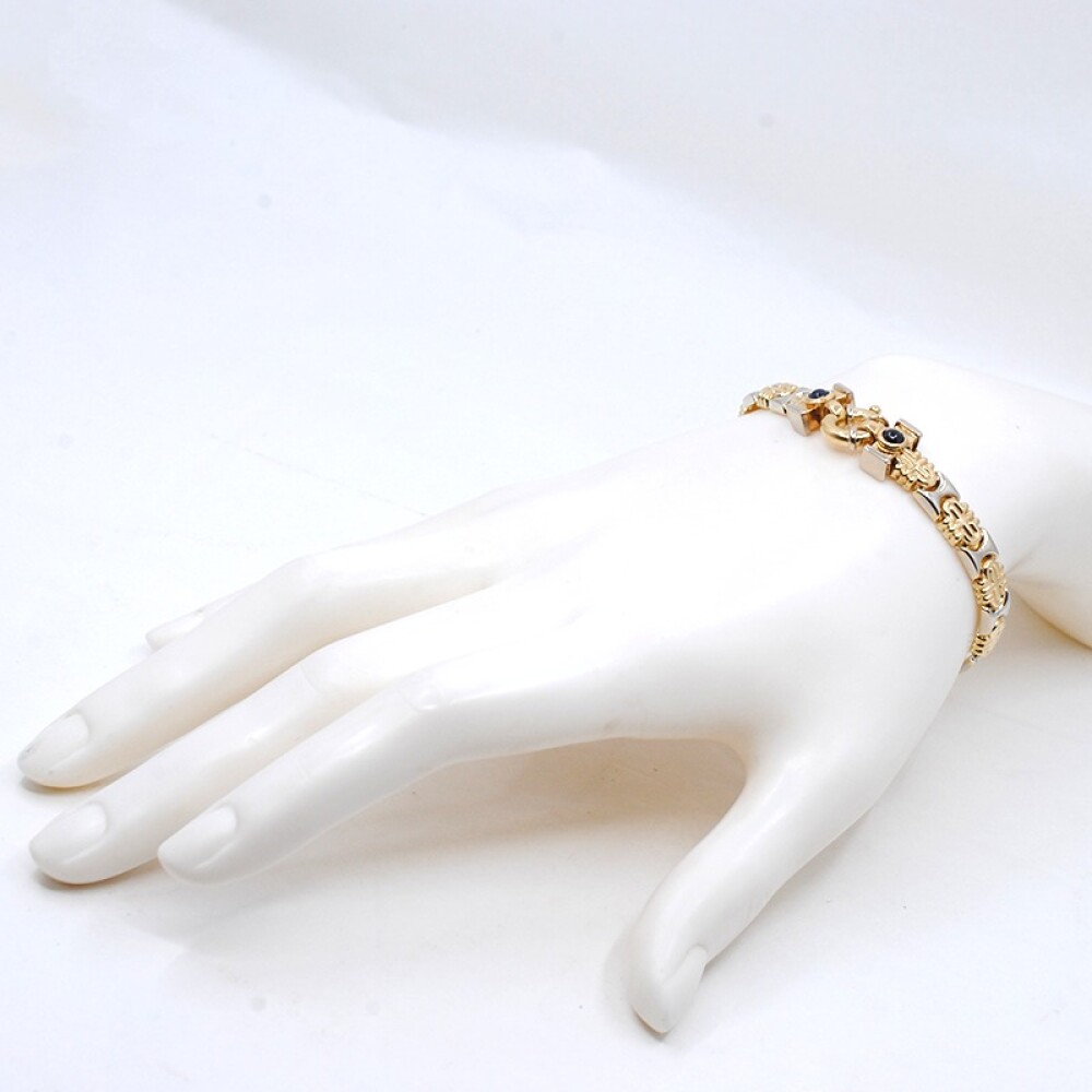 Pulsera en oro 18k combinada en 2 tonos con zafiro cabullon Pulsera en oro 18k combinada en 2 tonos con zafiro cabullon