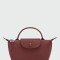 LONGCHAMP - LE PLIAGE ONE, CARTERA POUCH Bordó