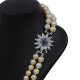 Collar de perlas mayor a menor con broche en oro 18k blanco, zafiro azul y brillantes Collar de perlas mayor a menor con broche en oro 18k blanco, zafiro azul y brillantes