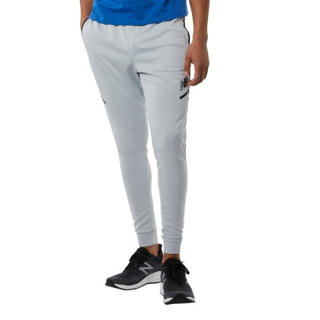 Pantalon New Balance de hombre - TENACITY - MP23091LAN BEIGE