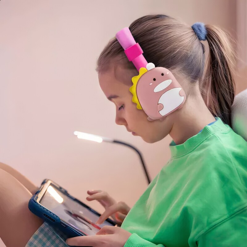 Auriculares bluetooth con vincha diseño dinosaurio rosado Auriculares bluetooth con vincha diseño dinosaurio rosado