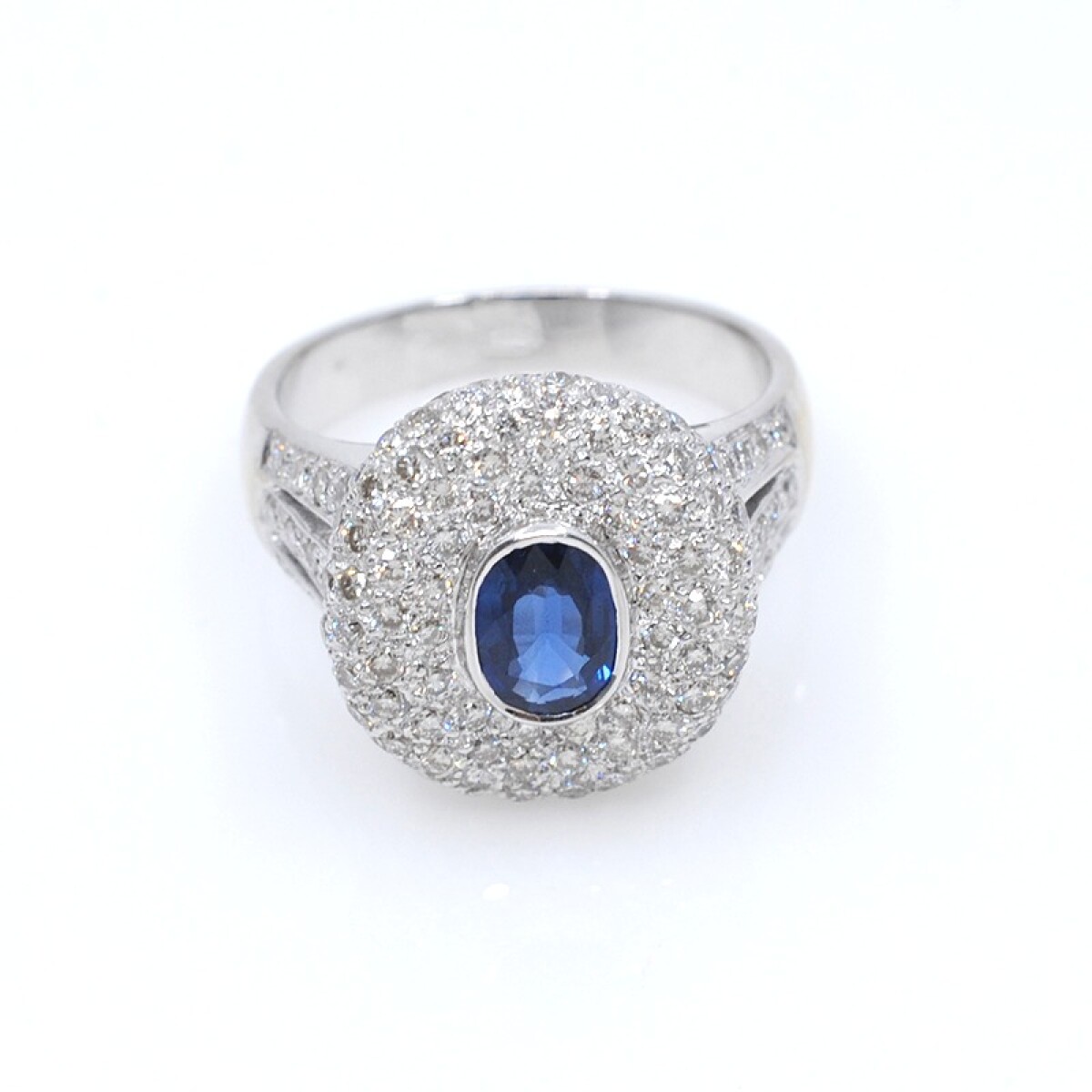 Anillo oro 18k blanco, brillantes y zafiro 