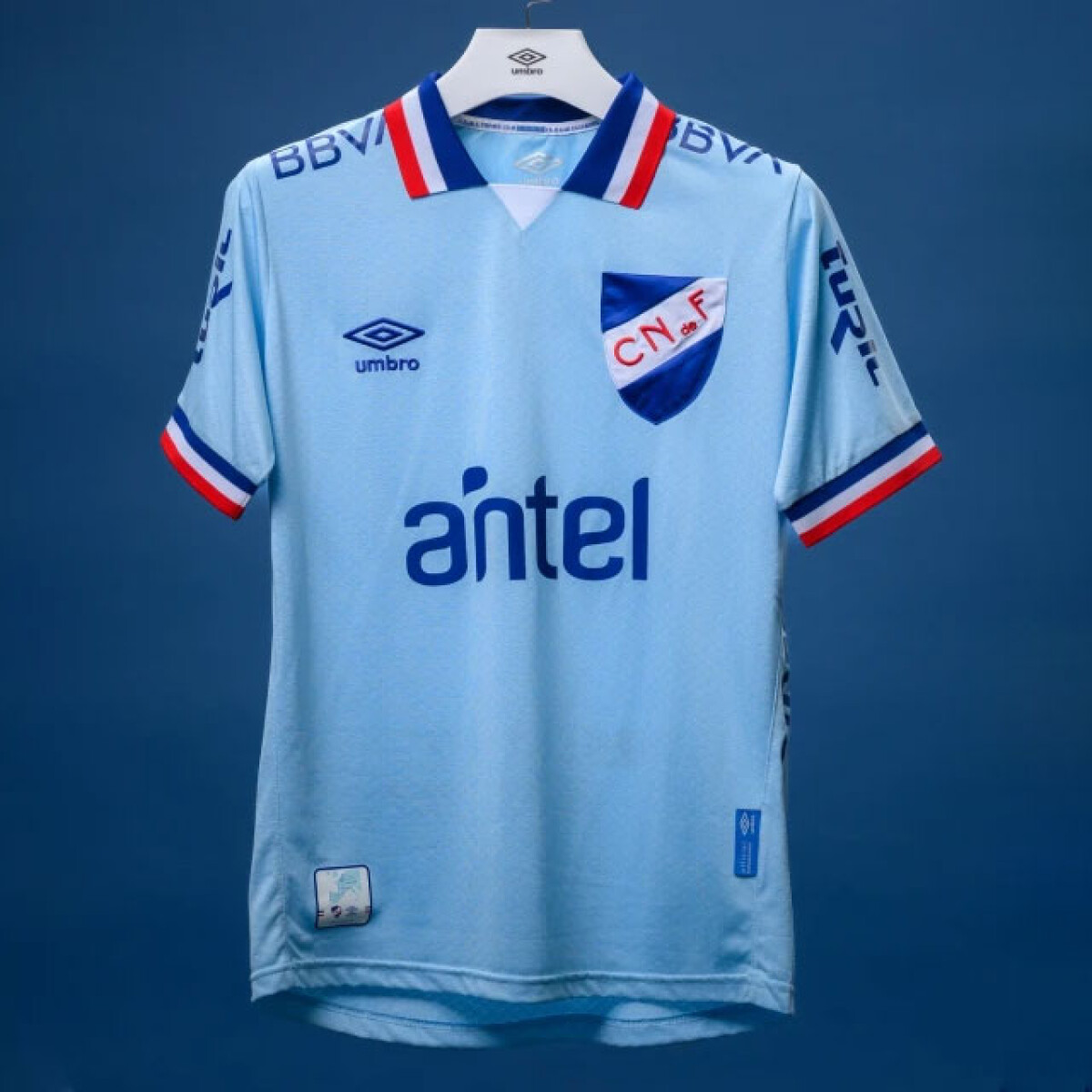 Camisetas Umbro Nacional con Sponsors Unisex - Celeste 