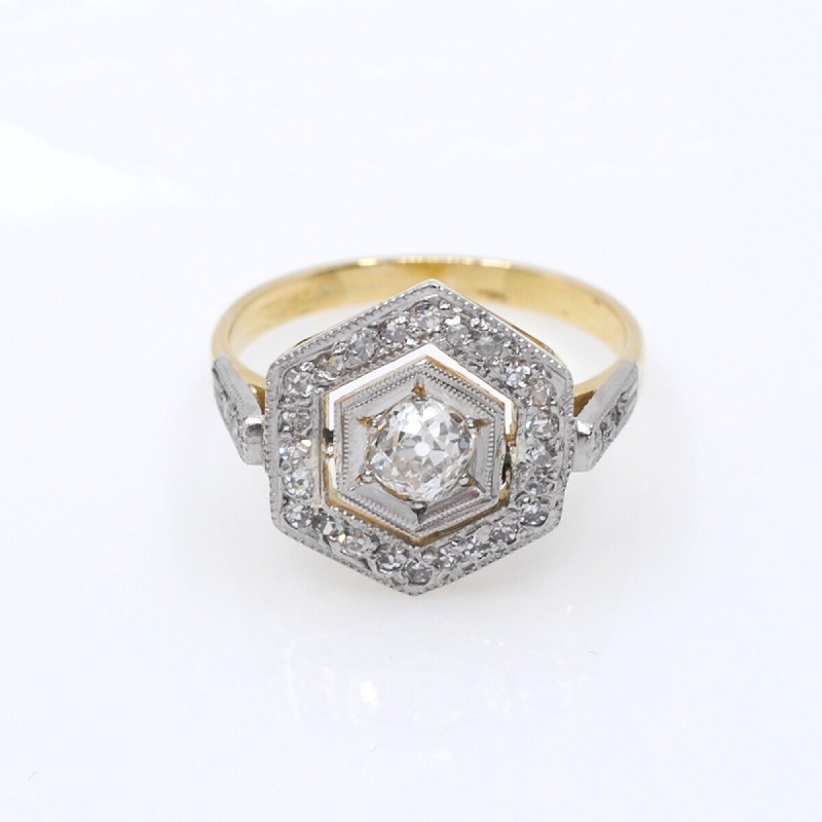 Anillo en oro 18k, platino y brillantes 