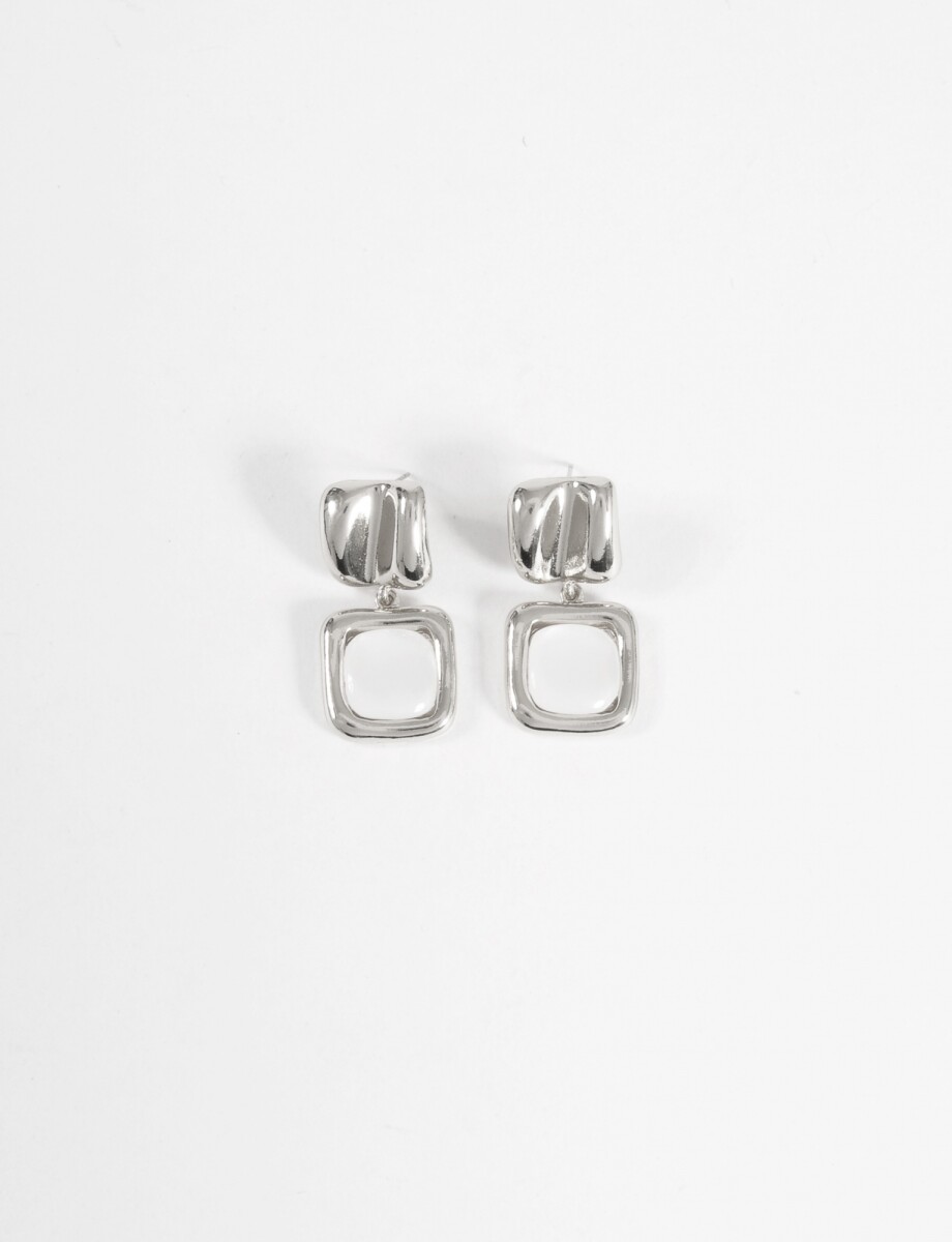 Caravanas metálicas dije nacarado - plateado 