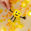 Glo Pals Set personaje + 2 cubos iluminados Amarillo