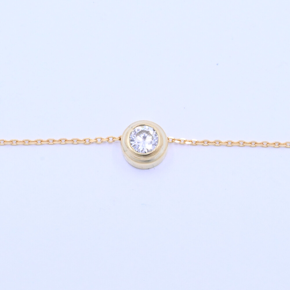Dije oro 18k y brillante doble virola. Dije oro 18k y brillante doble virola.