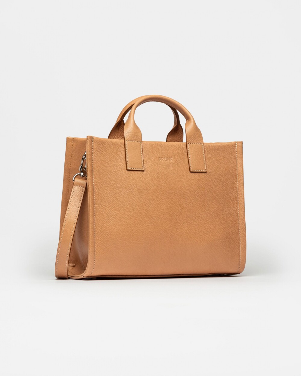 Cartera de mano Capri en cuero liso vegetal Vaqueta