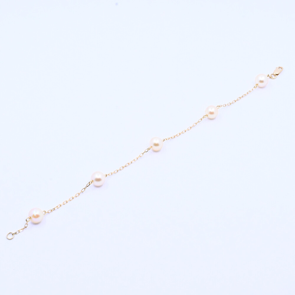 Pulsera oro 18 k y 5 perlas de cultivo. Pulsera oro 18 k y 5 perlas de cultivo.