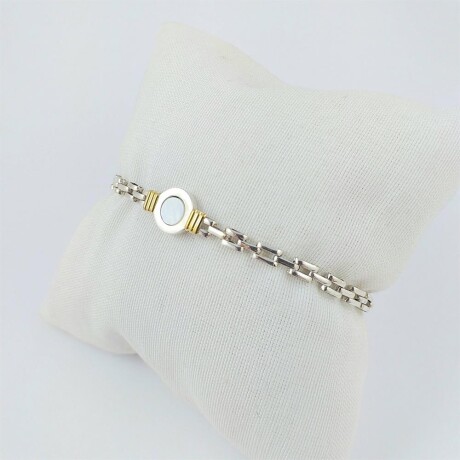 Pulsera de plata 925 panther con detalle de double oro 18Ktes, nácar central 1cm, ancho eslabón 4mm, largo 19cm. Pulsera de plata 925 panther con detalle de double oro 18Ktes, nácar central 1cm, ancho eslabón 4mm, largo 19cm.