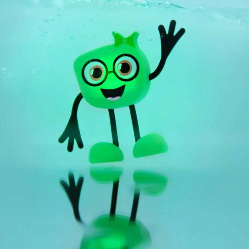 GLO PALS - Set personaje + 2 cubos iluminados Verde