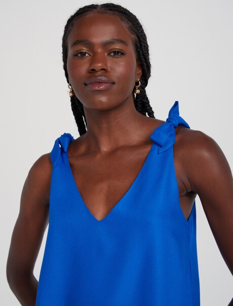 BLUSA FEMENINA SIN MANGAS CON LAZOS AZUL