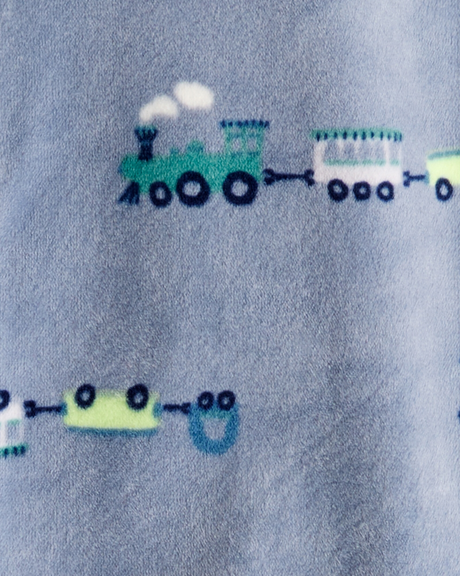 Pijama una pieza de DreamPlush, con pie, azul, diseño trenes. Talles 2-5T Sin color