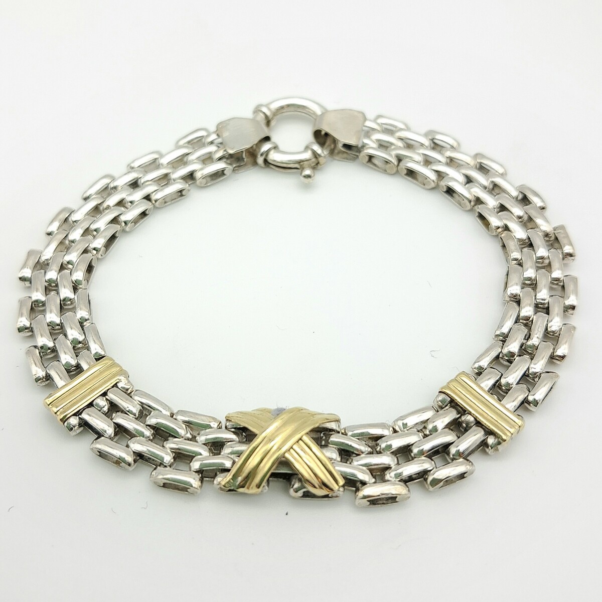 Pulsera de plata 925 y double en oro 18 ktes, PANTER. 