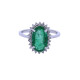 Anillo oro 14k esmeralda oval central y brillantes. Anillo oro 14k esmeralda oval central y brillantes.