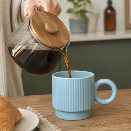 Taza de cerámica facetada con asa circular Celeste