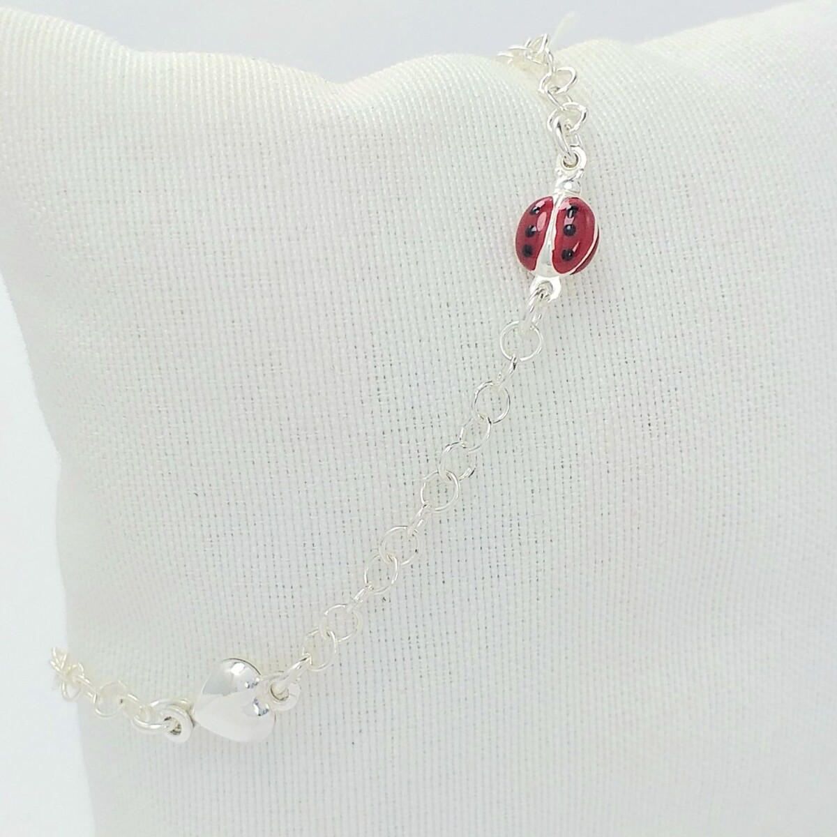 Pulsera de plata 925 con Mariquitas y corazón. 
