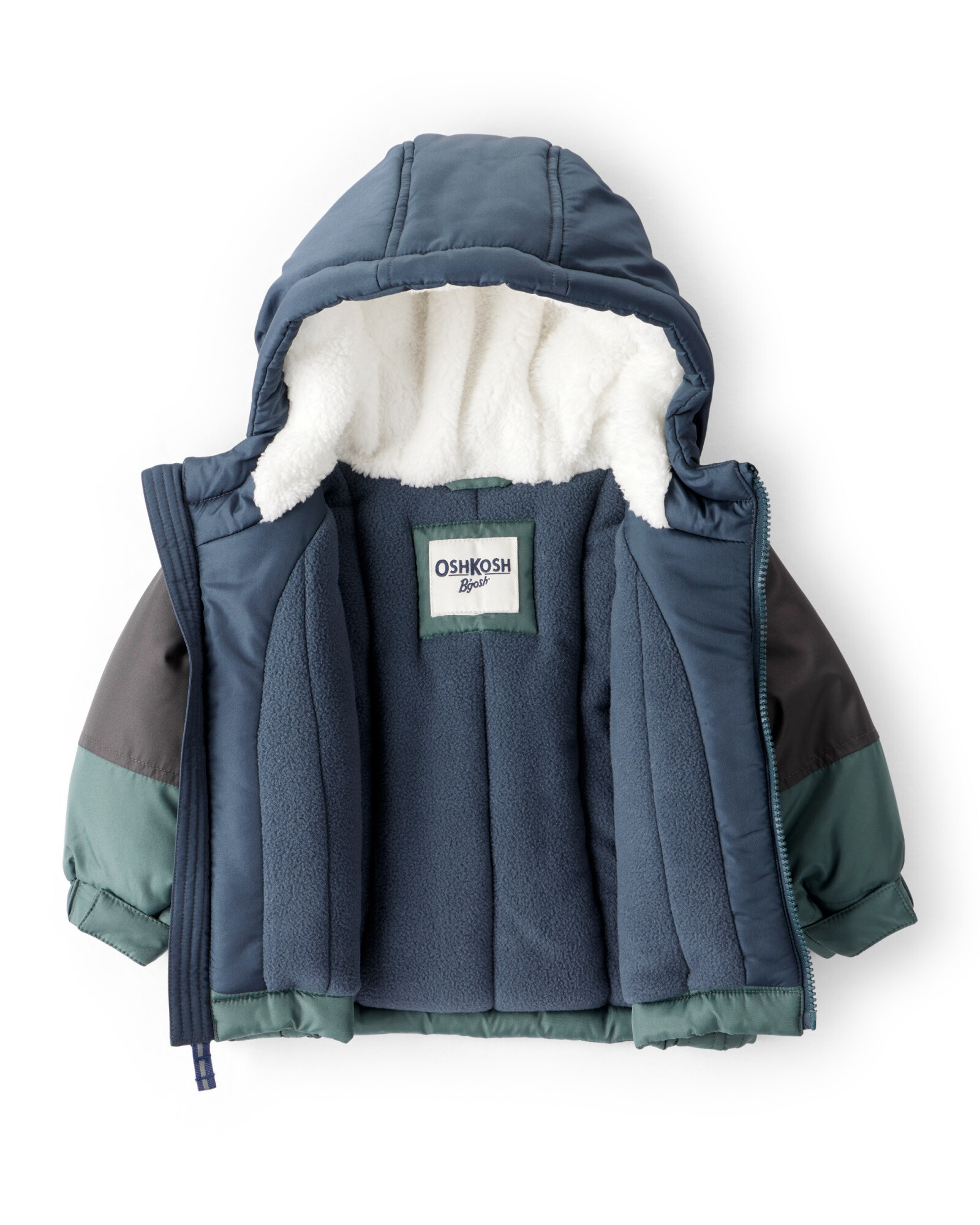 Campera resistente al agua, diseño bloques de color azul, negro y verde. Talles 12-24M Sin color