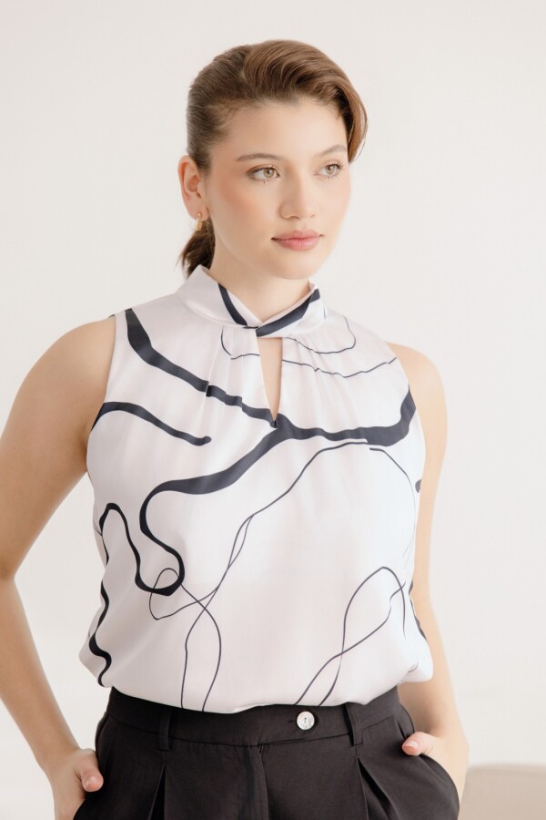 Blusa Halter. Estampa natural y negro.