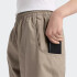 Pantalon New Balance Utility Marrón