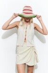 Falda corta con nudo beige