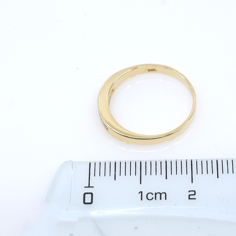 Anillo en oro 18k y 7 brillantes Anillo en oro 18k y 7 brillantes