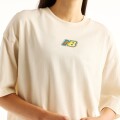 Remera New Balance de Dama - Sticker Pack - WT62P2R0LIN BEIGE