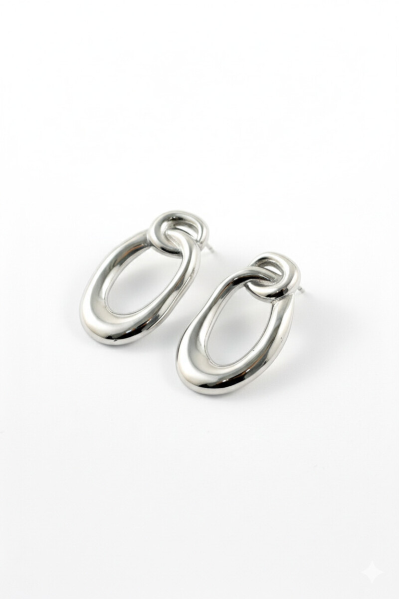 Caravanas de acero forma orgánica plateado