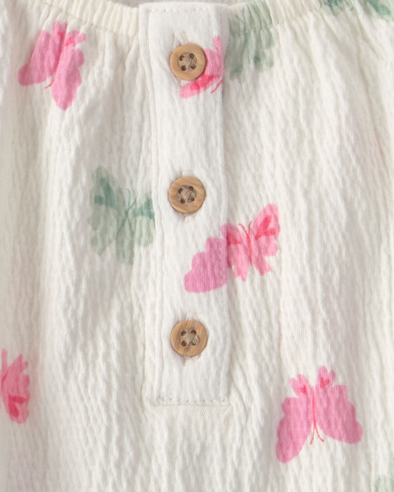 Set dos piezas, short de algodón y blusa de jersey arrugado, diseño mariposas. Talles 2-5T Sin color