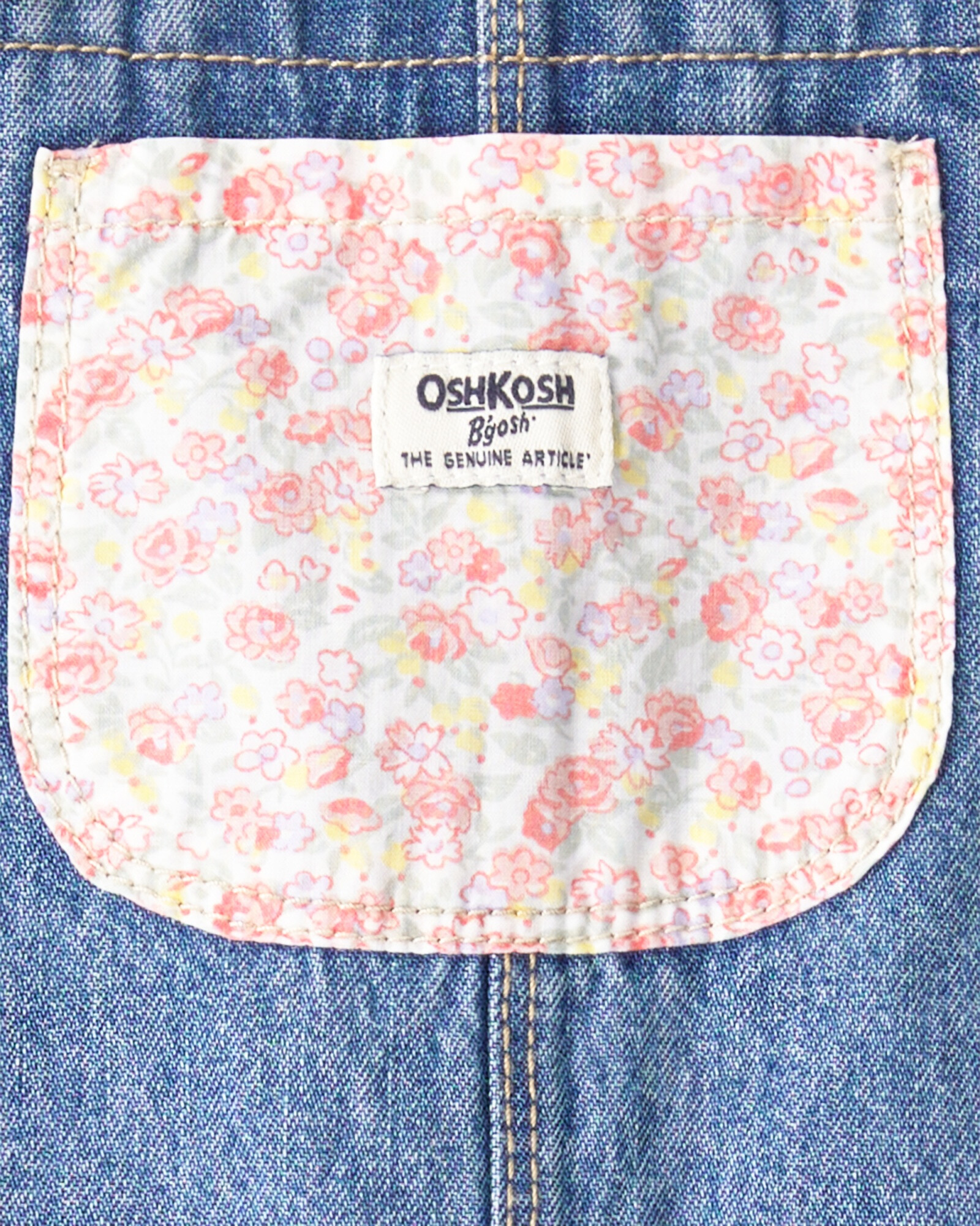 Enterito jean con parches florales. Talles 2-5T Enterito jean con parches florales. Talles 2-5T
