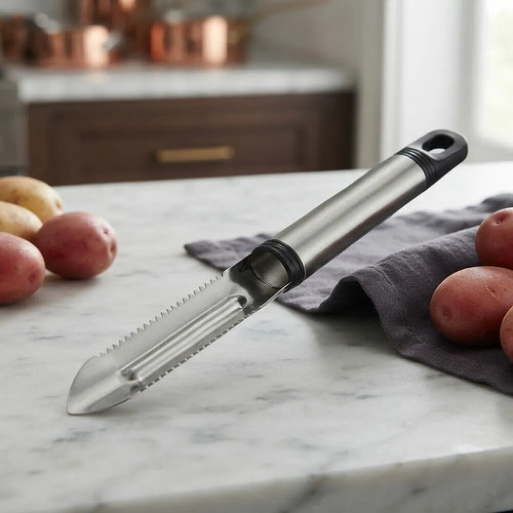 Pelador acero inox con mango negro Pelador acero inox con mango negro