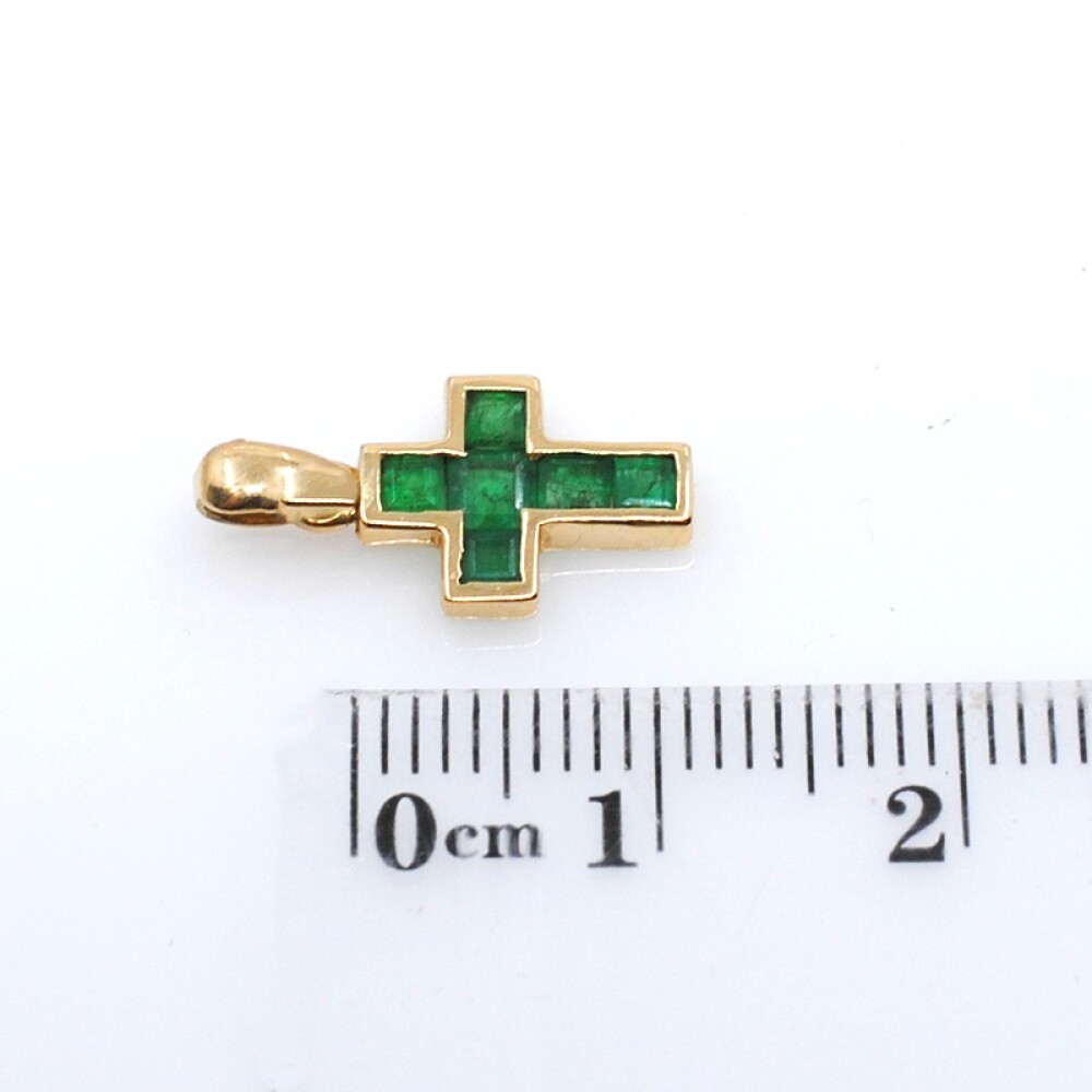 Cruz pequeña en oro 18k y esmeraldas Cruz pequeña en oro 18k y esmeraldas