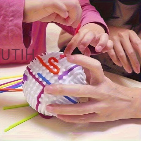 Pelota sensorial con 16 cuerdas de silicona Sc