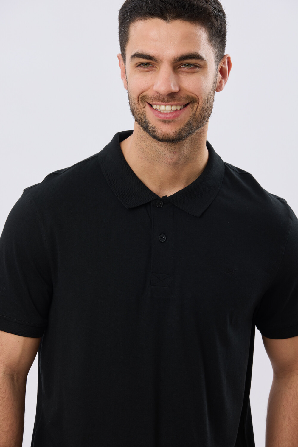 REMERA POLO LISA JERSEY Negro
