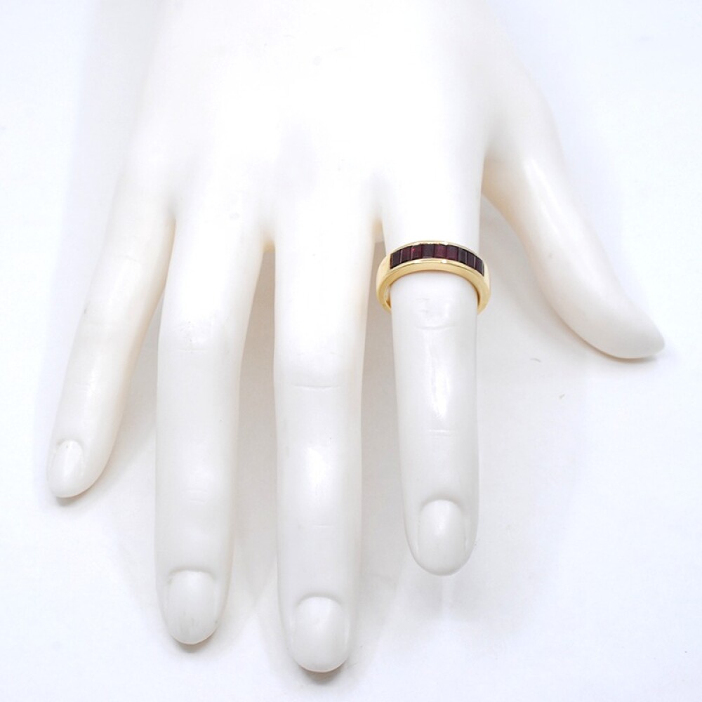 Anillo en oro 18k amarillo y 9 rubies corte baguette Anillo en oro 18k amarillo y 9 rubies corte baguette