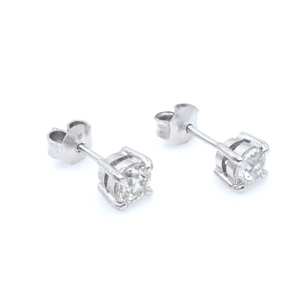 Caravanas en oro 18k blanco y brillantes. Caravanas en oro 18k blanco y brillantes.