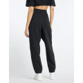 Pantalon de Mujer New Balance French Terry Jogger Negro