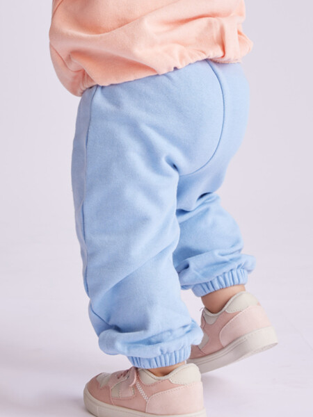 Pantalón deportivo estampado Celeste