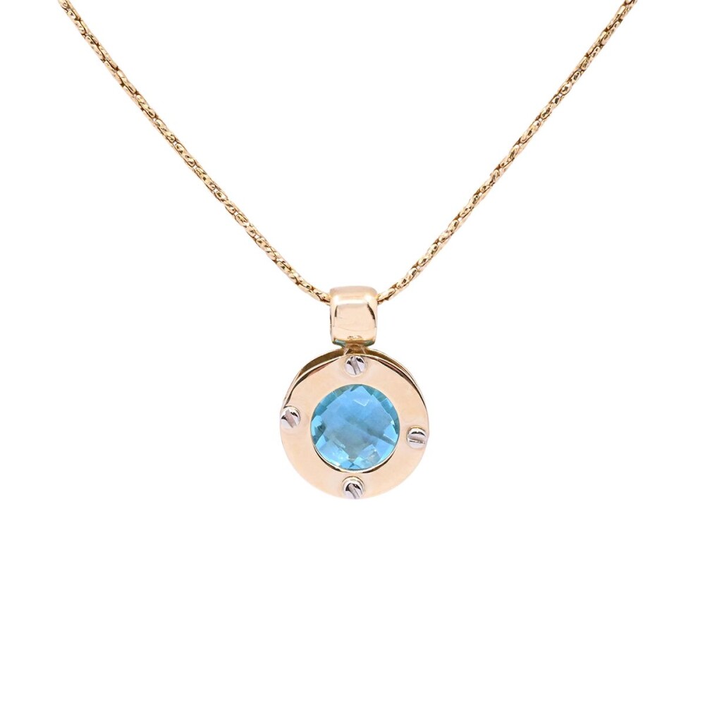 Colgante oro 18k 2 tonos con topacio azul. Colgante oro 18k 2 tonos con topacio azul.