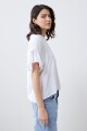 Blusa con volado blanco