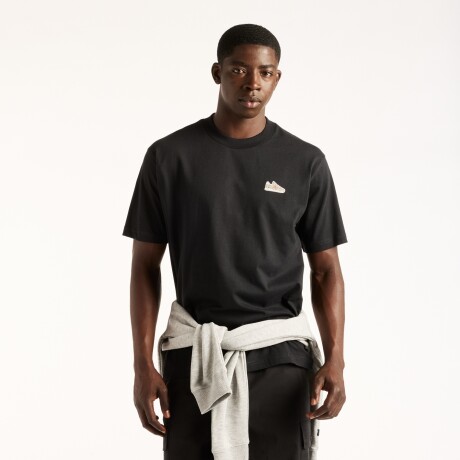Remera New Balance de Hombre - Sticker Pack - MT62E2FFBK BLACK
