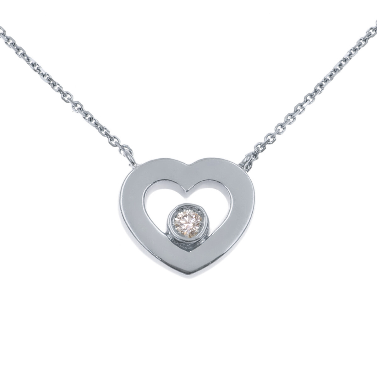 Colgante y cadena Sabrina corazón de oro blanco 18k. con brillante 